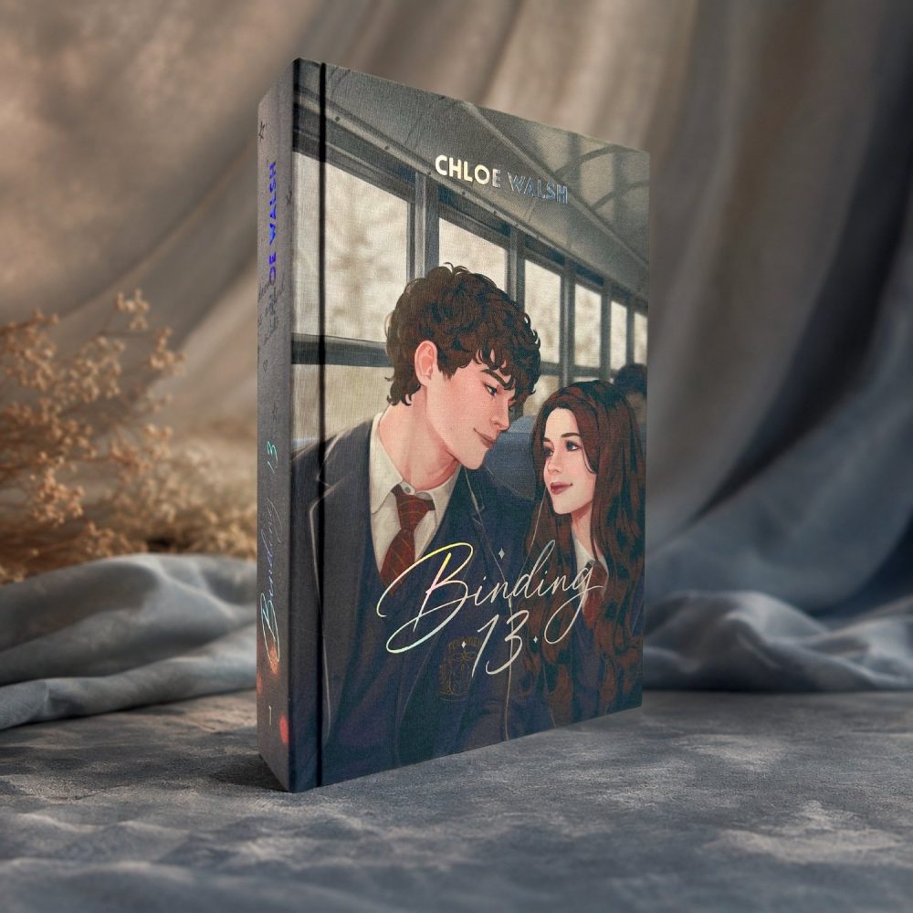Cubierta de Binding 13 edición especial ilustrada, con Shannon y Johnny en el autobús del instituto